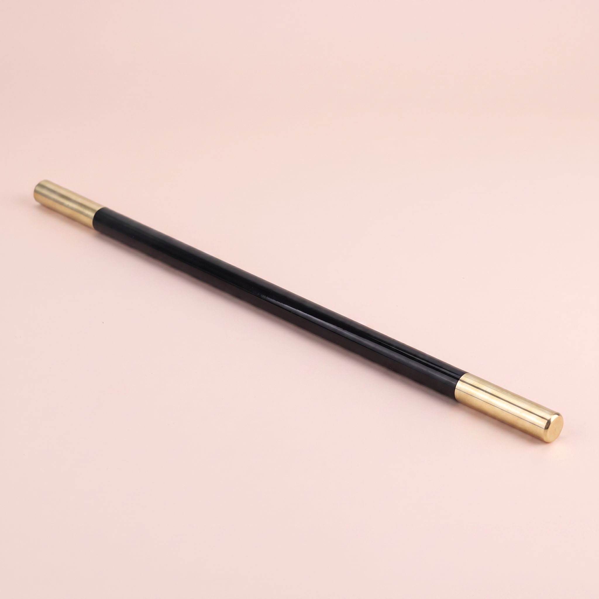 Baguette noire pointes laiton